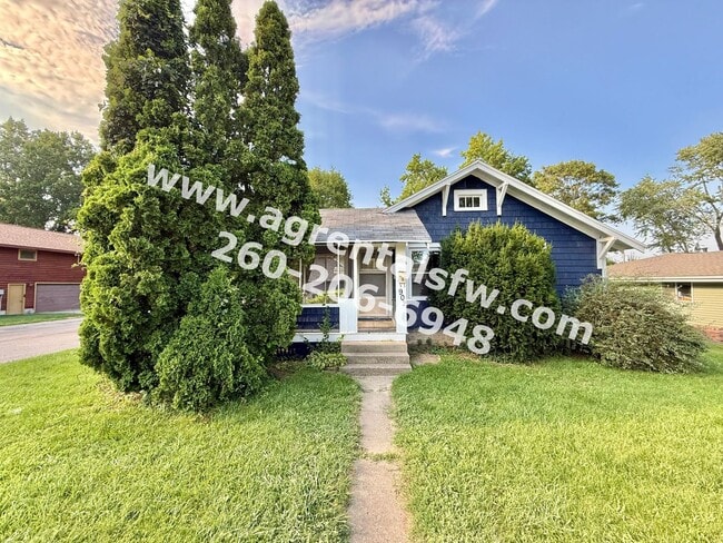 property at 902 E 1st St
