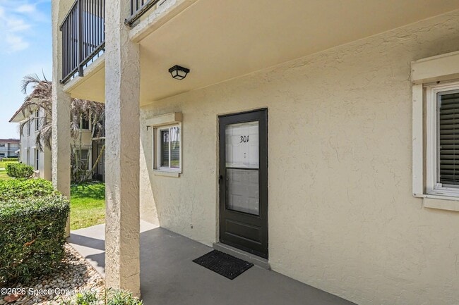 201 St Lucie Ln, Unit 301 in Cocoa Beach, FL - Foto de edificio - Building Photo