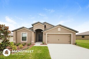 1452 Swan Lake Cir in Dundee, FL - Building Photo