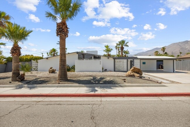 property at 915 E Racquet Club Rd