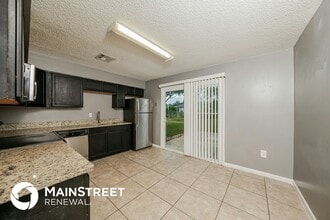 7500 Coquina Ave, Unit 207 in Fort Pierce, FL - Building Photo - Building Photo