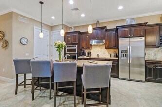 9179 Flint Ct in Naples, FL - Foto de edificio - Building Photo