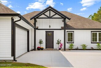 114 Lake Merial Trail in Southport, FL - Building Photo - Building Photo