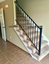 409 S Darrowby Dr in Raymore, MO - Building Photo - Building Photo