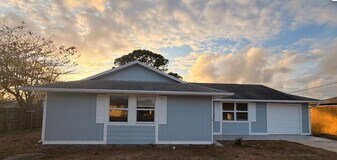 1734 SW Carolina St in Port St. Lucie, FL - Building Photo