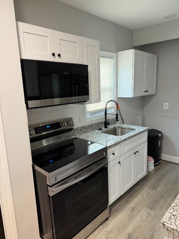 716 E 23rd St in Baltimore, MD - Foto de edificio - Building Photo