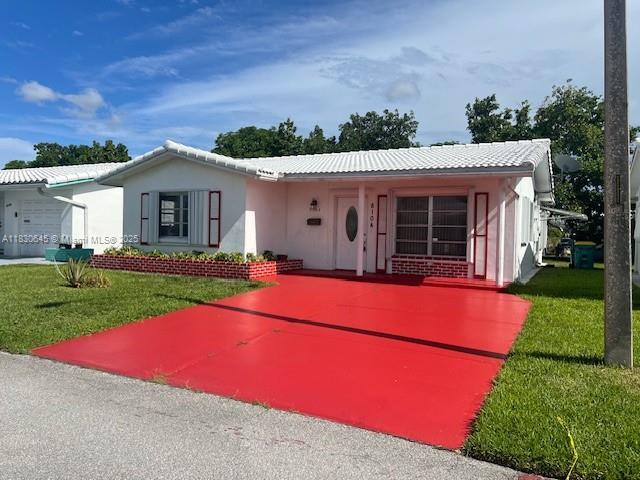 8104 NW 58th Pl in Tamarac, FL - Building Photo - Building Photo