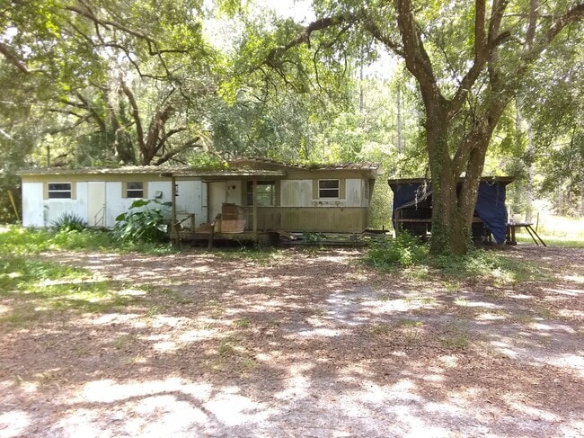 property at 116 SE 411th St