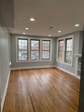 4921 W Addison St, Unit 1 in Chicago, IL - Foto de edificio - Building Photo