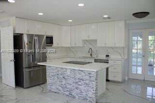 3954 Coconut Cir N, Unit B-128 in Naples, FL - Building Photo - Building Photo