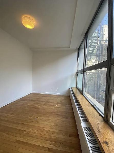 102 Fulton St in New York, NY - Building Photo - Building Photo