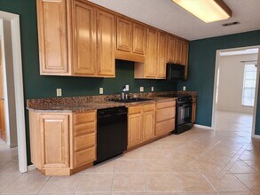 9001 Woodrun Rd in Pensacola, FL - Building Photo - Building Photo