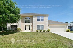 2553 SW Grotto Cir in Port St. Lucie, FL - Building Photo