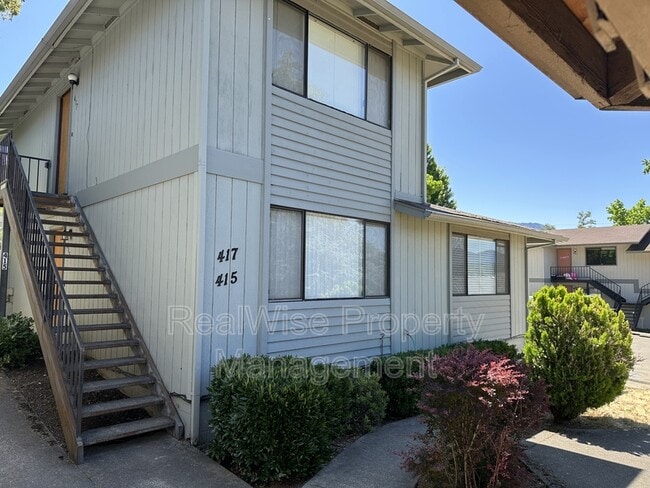 property at 415 NE Silverwood Pl