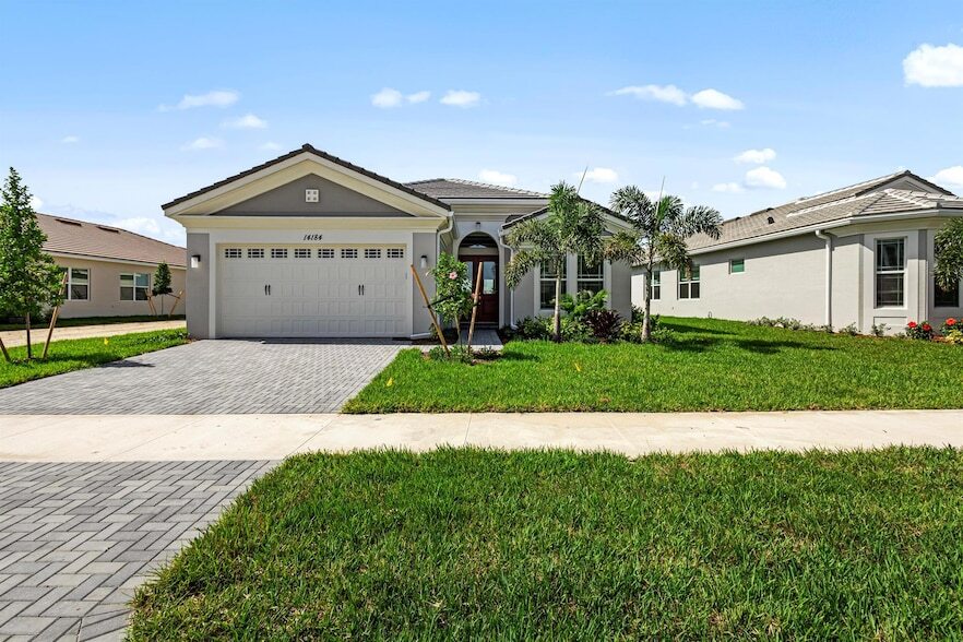 14184 Lacebark, Unit 105 in Loxahatchee, FL - Building Photo