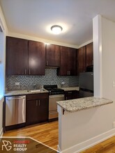 633 W Barry Ave, Unit #635-107 in Chicago, IL - Building Photo - Building Photo