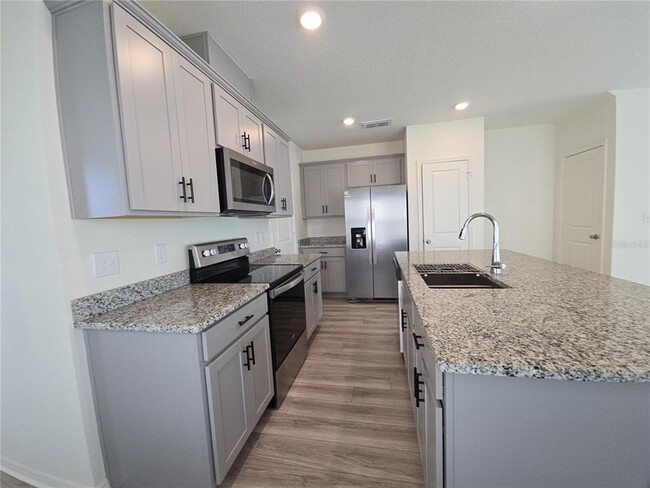 1384 Mirabella Cir in Davenport, FL - Foto de edificio - Building Photo