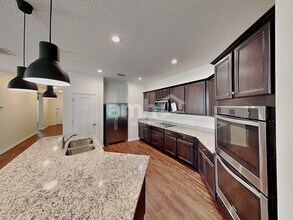 5116 Piazza Loop in Magnolia Square, FL - Building Photo - Building Photo