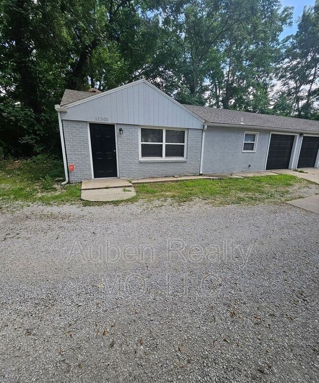 property at 11300 E 15th St S