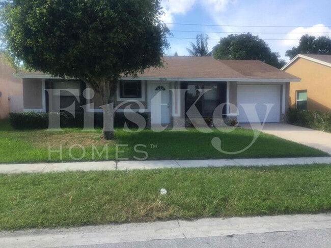 property at 5896 Triphammer Rd