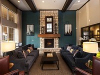 Clubhouse with Fireplace - Legacy Heights Apartamentos in Denver, Colorado