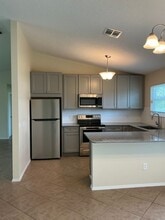 1487 SW Leisure Ln in Port St. Lucie, FL - Building Photo - Building Photo