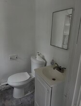 4 Quigley Ct, Unit 4 in Winchester, MA - Foto de edificio - Building Photo