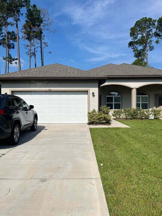 15 Empire Ln in Palm Coast, FL - Building Photo