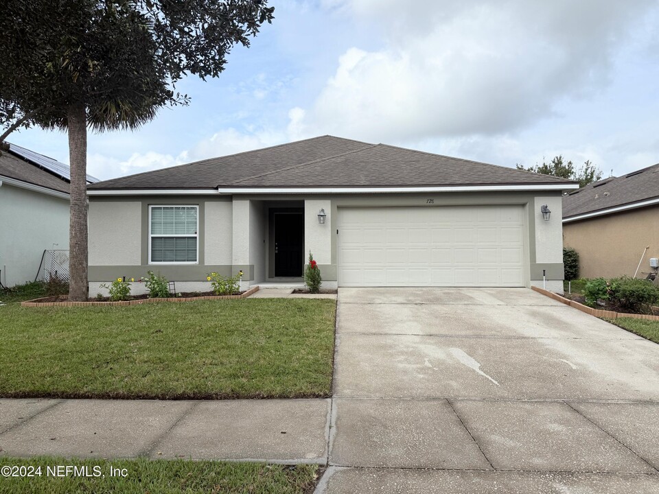 728 Sunny Stroll Dr in Middleburg, FL - Building Photo