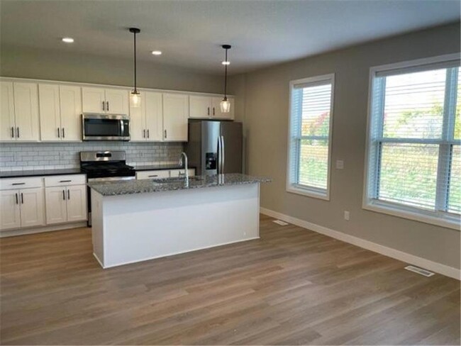 11410 51st St NE, Unit 1125 in Albertville, MN - Foto de edificio - Building Photo