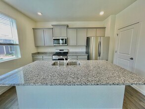 Spacious 4-Bedroom Wellington Home with 3-Car Garage, Loft & Fenced Backyard! in Wellington, CO - Building Photo - Building Photo