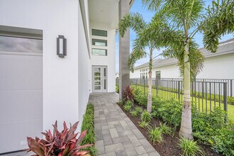 10040 Stockrun Dr in Palm Beach Gardens, FL - Building Photo - Building Photo