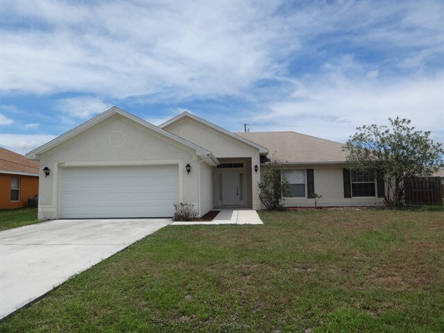 1277 SW San Esteban Ave in Port St. Lucie, FL - Building Photo