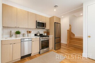 Modern Duplex-Style Residence with Designer Finishes on Historic Eastern Parkway in Brooklyn, NY - Building Photo - Building Photo