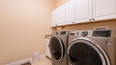 7711 Martino Cir in Naples, FL - Building Photo - Building Photo