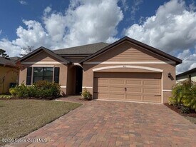 831 Remington Green Dr SE in Palm Bay, FL - Building Photo