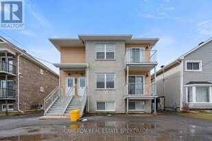 1234 Cumberland St in Cornwall, ON - Building Photo