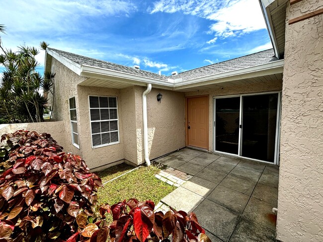 1495 Malibu Cir NE-Unit -APT 107 in Palm Bay, FL - Building Photo - Building Photo