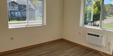 Maplewood Eco Cottages- Ages 55+ in Menomonie, WI - Building Photo - Building Photo