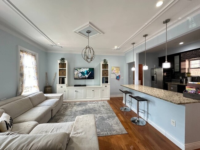 property at 495 E 3rd St