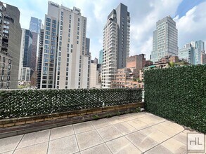 EAST 49 STREET in New York, NY - Building Photo - Building Photo