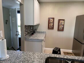 2727 N Wickham Rd, Unit 1 in Melbourne, FL - Building Photo - Building Photo