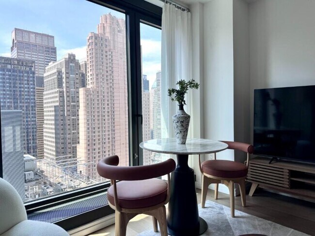 111 W 56th St in New York, NY - Building Photo - Building Photo