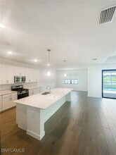 19421 Hinkley Dr in Estero, FL - Building Photo - Building Photo