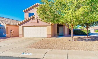13874 N 91st Dr in Peoria, AZ - Building Photo