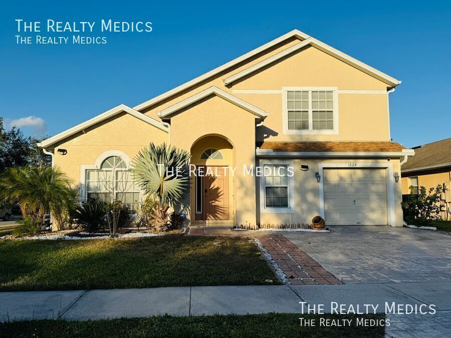 1228 Sandy Ridge Dr in Davenport, FL - Building Photo