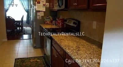 4862 Benhill Dr in Harrisburg, NC - Building Photo - Building Photo