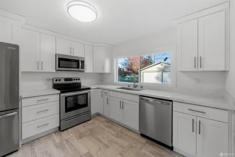 911 E 52nd St in Tacoma, WA - Foto de edificio - Building Photo