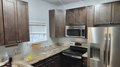 2109 Rousseau St, Unit 5-5-202 in New Orleans, LA - Building Photo - Building Photo