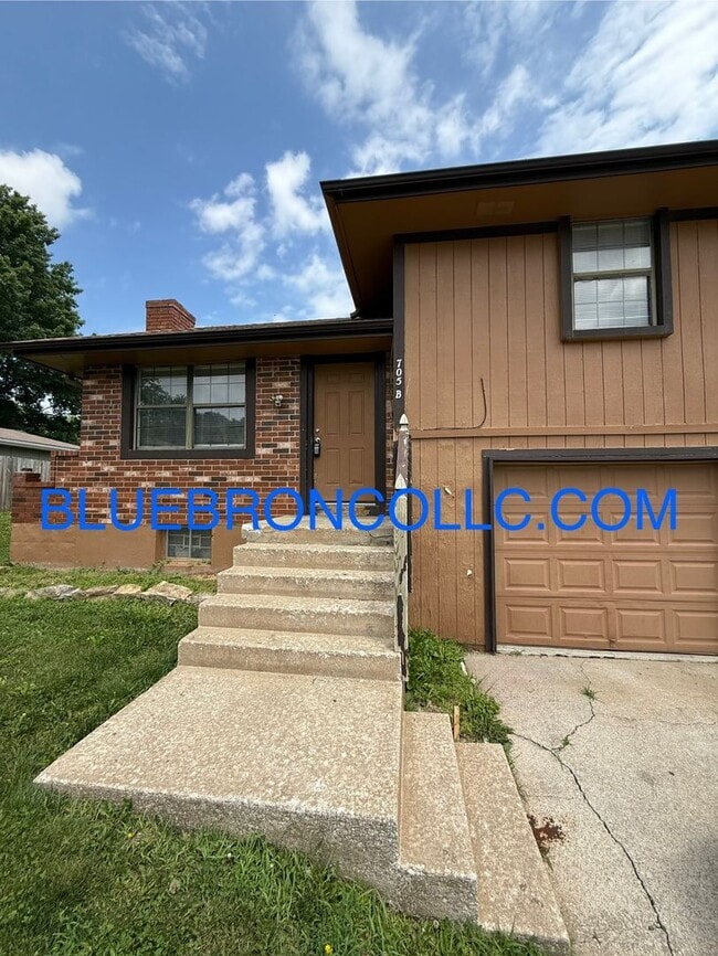 property at 705 NE Banner Dr